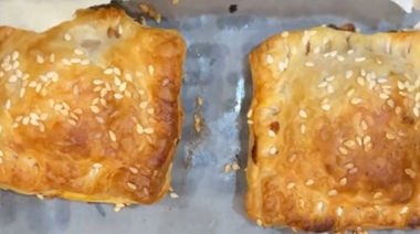 Golden puff pastry bites stuffed with Schezwan chicken and cheese filling